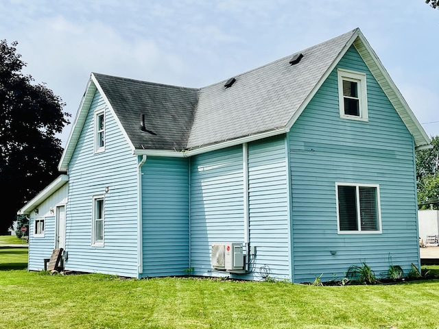 201 Clay St, Rockford, OH 45882 - view of side of home with a yard and a shingled roof