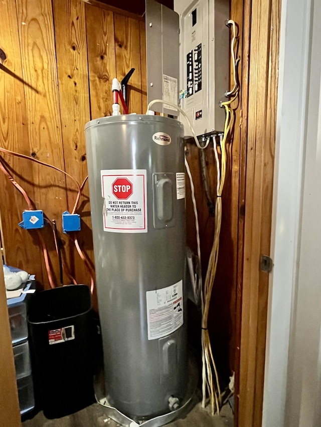 201 Clay St, Rockford, OH 45882 - utility room featuring electric water heater and electric panel