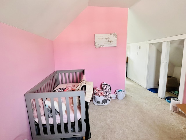 201 Clay St, Rockford, OH 45882 - bedroom with lofted ceiling, carpet flooring, and a crib