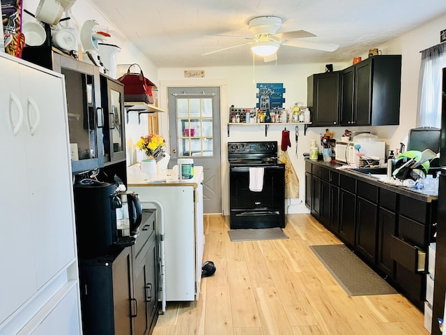 201 Clay St, Rockford, OH 45882 - kitchen with electric range, ceiling fan, open shelves, dark cabinetry, and light wood-style flooring