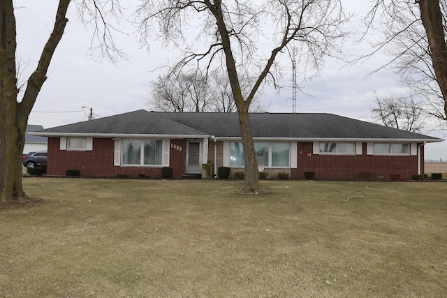 single story home with a front yard