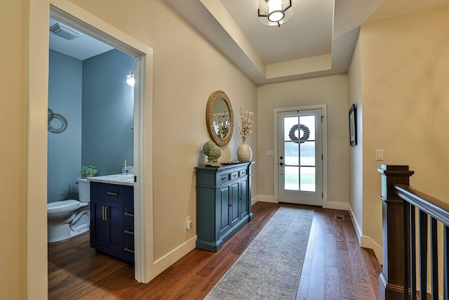 1439 Legacy Ct, Troy, OH 45373 - foyer with dark wood-type flooring and a raised ceiling