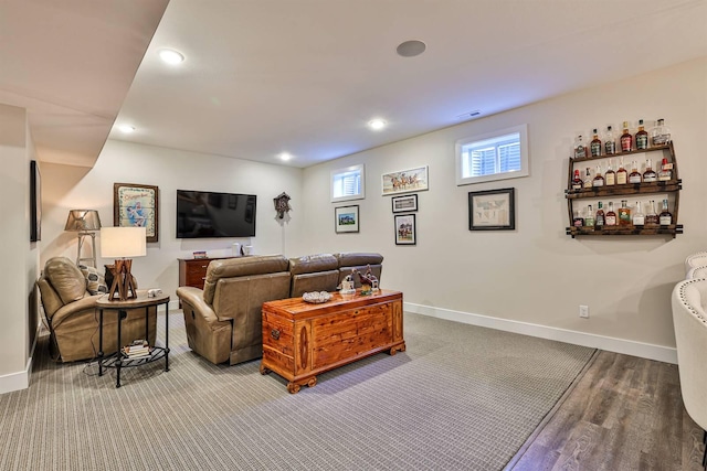 1439 Legacy Ct, Troy, OH 45373 - living room featuring recessed lighting, wood finished floors, and a dry bar