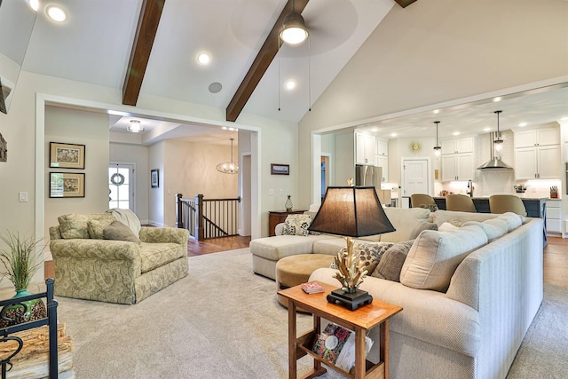 1439 Legacy Ct, Troy, OH 45373 - living area featuring high vaulted ceiling, recessed lighting, beamed ceiling, ceiling fan, and light wood finished floors