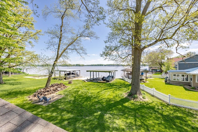9342 State Route 368, Huntsville, OH 43324 - view of yard featuring a dock, a water view, and boat lift