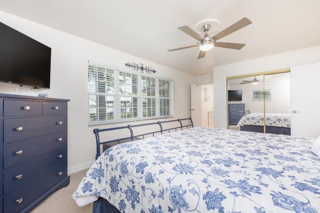 9342 State Route 368, Huntsville, OH 43324 - bedroom featuring light colored carpet, a closet, baseboards, and a ceiling fan