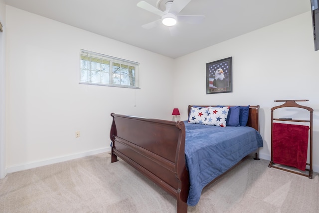 9342 State Route 368, Huntsville, OH 43324 - carpeted bedroom featuring baseboards and a ceiling fan