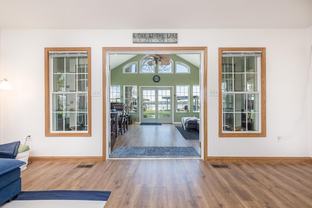 9342 State Route 368, Huntsville, OH 43324 - doorway to outside with wood finished floors, baseboards, and a ceiling fan