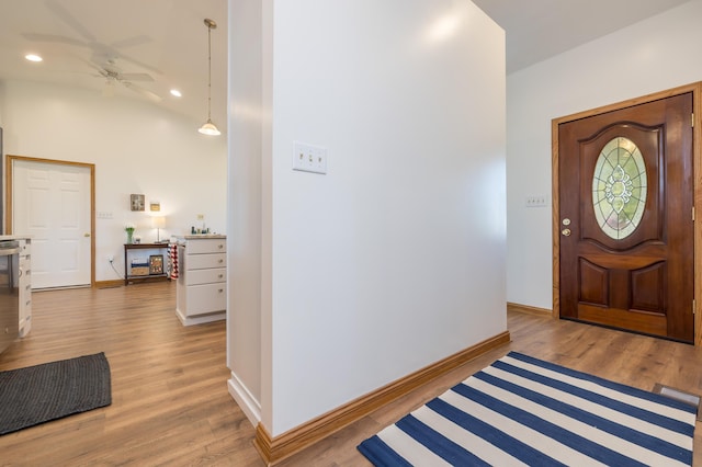 9342 State Route 368, Huntsville, OH 43324 - foyer entrance featuring wood finished floors, ceiling fan, baseboards, and recessed lighting
