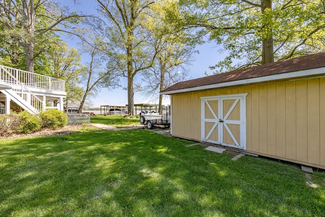 9342 State Route 368, Huntsville, OH 43324 - view of grassy yard featuring stairway and a wooden deck