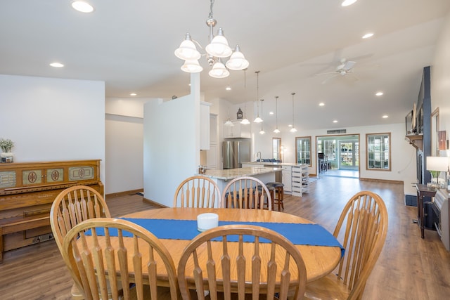 9342 State Route 368, Huntsville, OH 43324 - dining area with a ceiling fan, light wood-style floors, recessed lighting, a chandelier, and baseboards