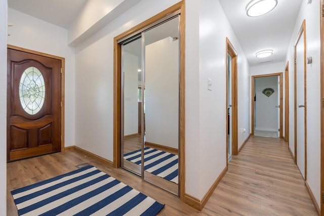 9342 State Route 368, Huntsville, OH 43324 - entrance foyer with light wood-style floors and baseboards