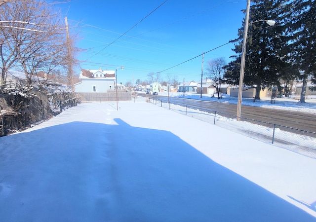 view of yard covered in snow