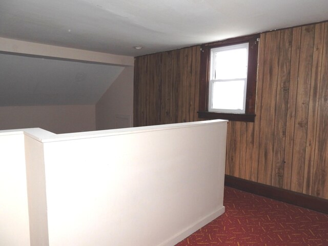 hallway with wooden walls