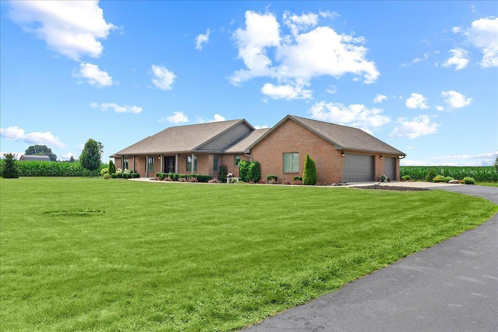 9178 Carey Rd, West Liberty, OH 43357 - photo 1