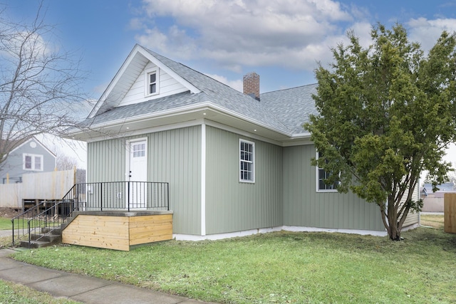 view of home's exterior featuring a lawn