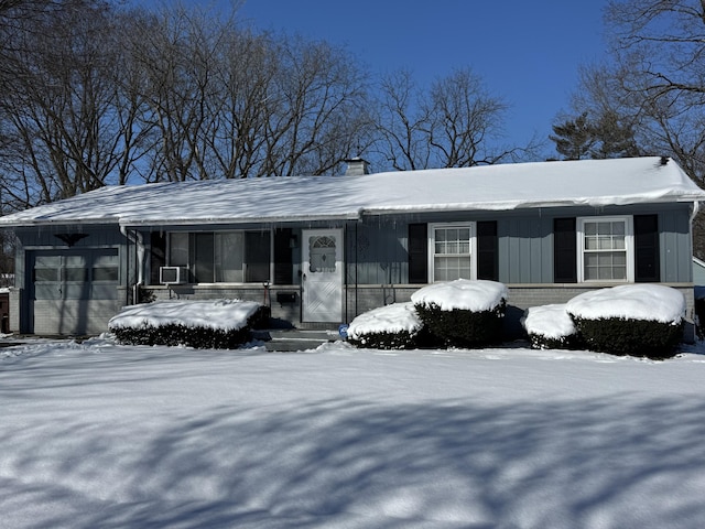 ranch-style house featuring cooling unit