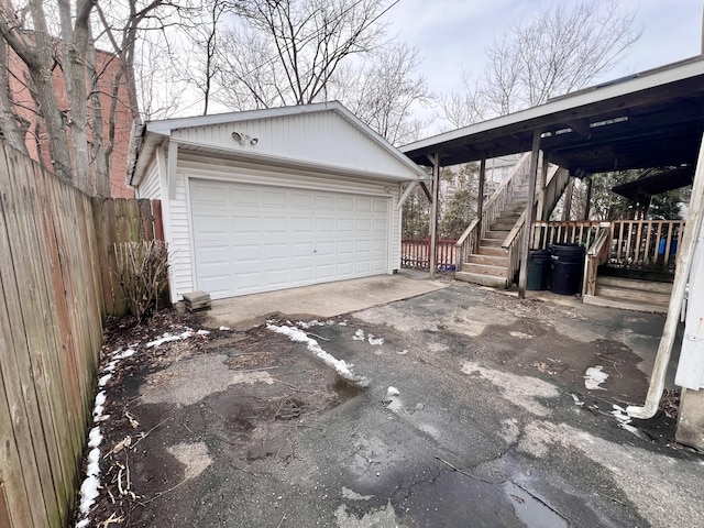 detached garage with fence