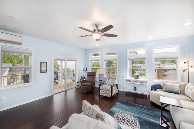 11177 Sassafrass Rd, Lakeview, OH 43331 - living room with an AC wall unit, wood finished floors, a ceiling fan, baseboards, and recessed lighting