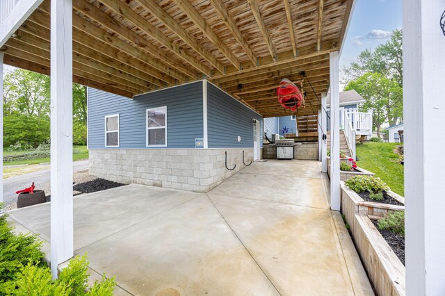11177 Sassafrass Rd, Lakeview, OH 43331 - view of patio / terrace featuring stairs