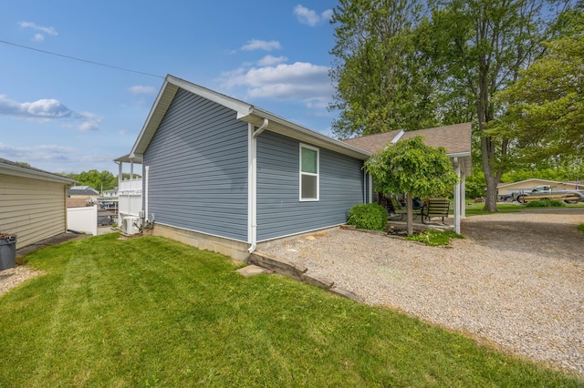 11177 Sassafrass Rd, Lakeview, OH 43331 - view of property exterior featuring a yard and a patio