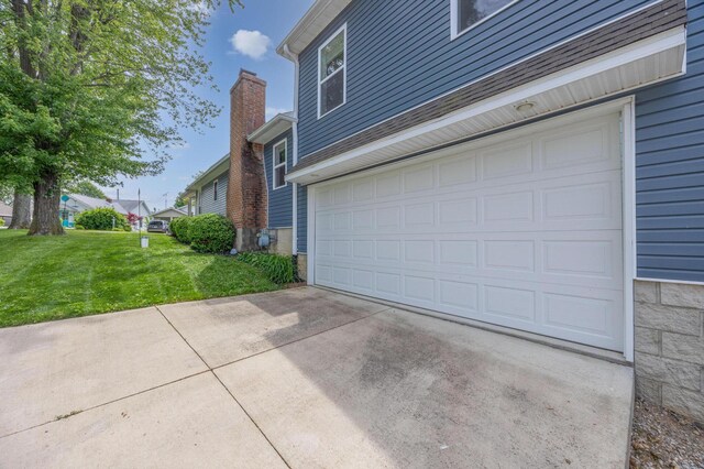 11177 Sassafrass Rd, Lakeview, OH 43331 - garage featuring concrete driveway