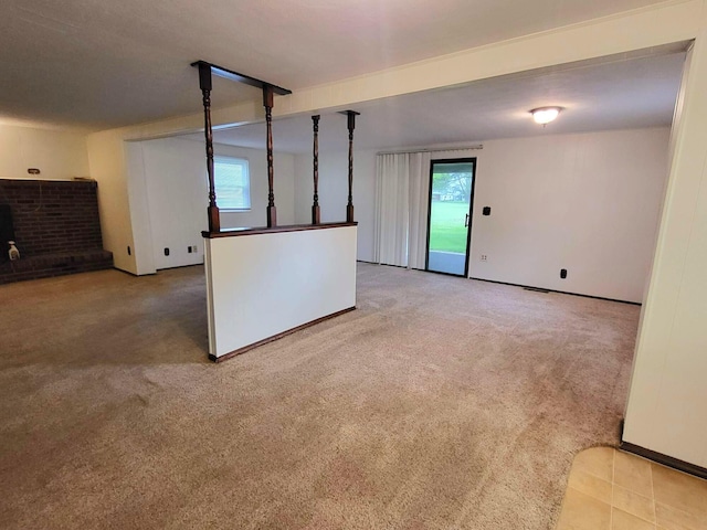 2169 State Route 49, Arcanum, OH 45304 - unfurnished living room featuring carpet flooring and a healthy amount of sunlight