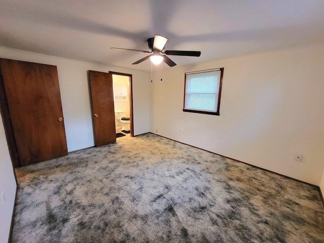 2169 State Route 49, Arcanum, OH 45304 - unfurnished bedroom with ceiling fan, carpet, and ensuite bath