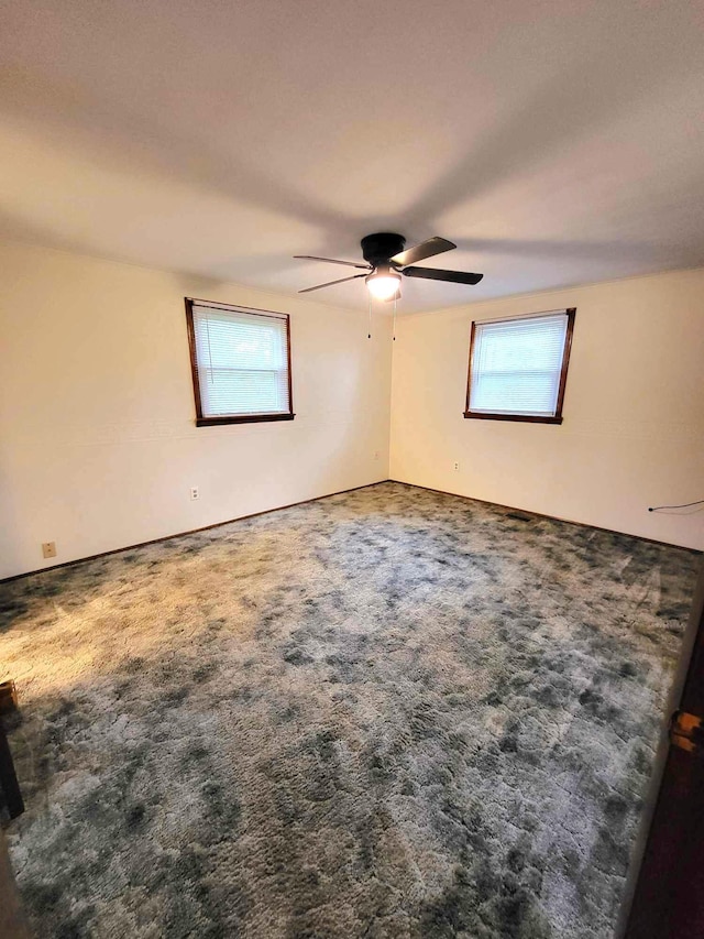 2169 State Route 49, Arcanum, OH 45304 - spare room featuring carpet and ceiling fan