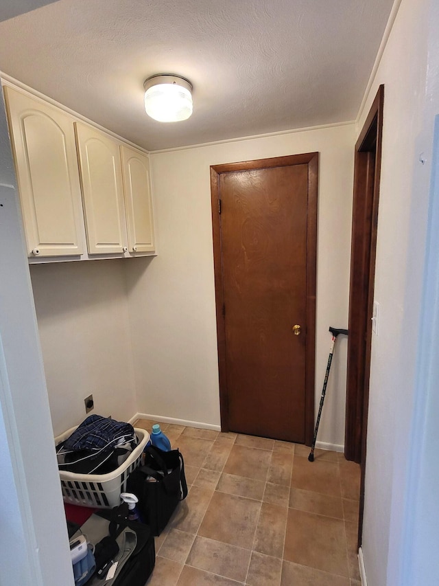 2169 State Route 49, Arcanum, OH 45304 - laundry room featuring cabinet space and baseboards