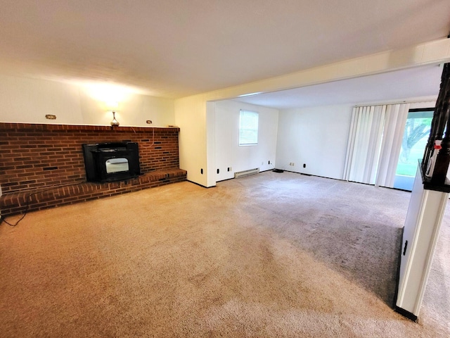 2169 State Route 49, Arcanum, OH 45304 - unfurnished living room with a baseboard heating unit, baseboards, carpet, and a wood stove