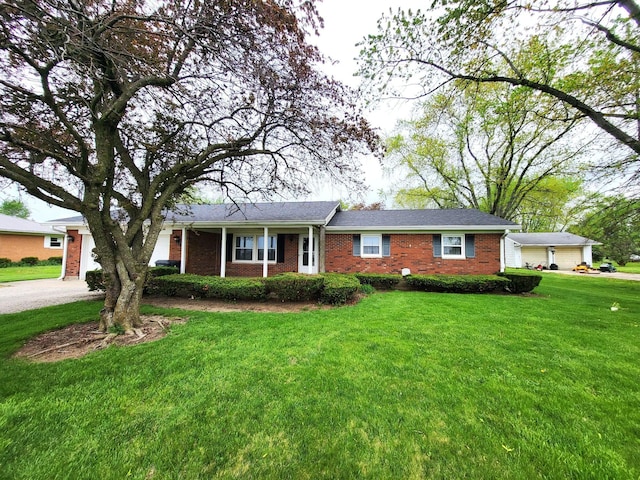 2169 State Route 49, Arcanum, OH 45304 - ranch-style home featuring brick siding and a front lawn
