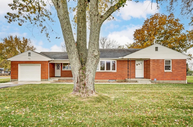 single story home with a garage and a front yard