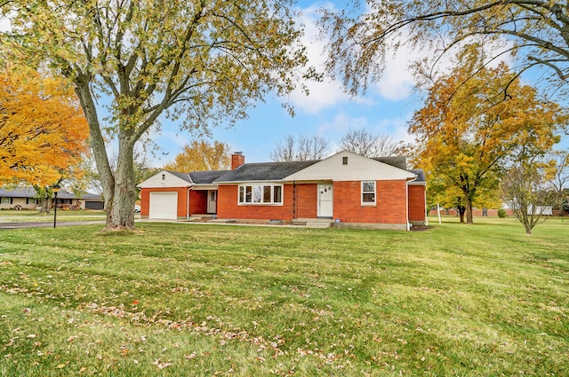 ranch-style home with a garage and a front yard