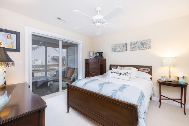 carpeted bedroom featuring access to exterior and ceiling fan