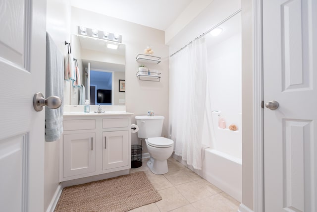 full bathroom featuring tile patterned flooring, vanity, shower / bath combination with curtain, and toilet