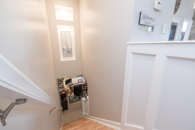 stairway with wood-type flooring