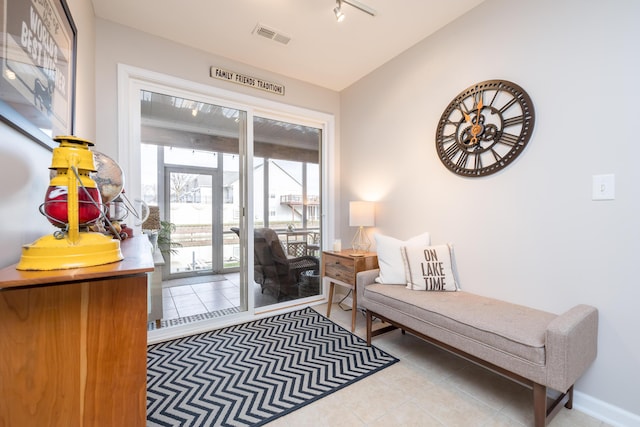 interior space featuring light tile patterned flooring