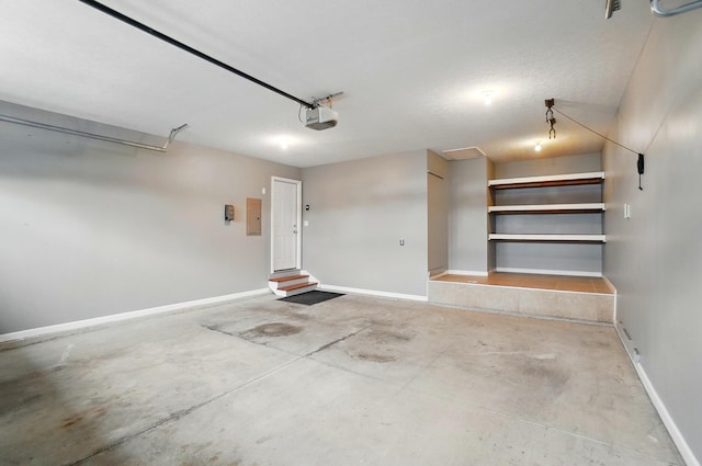 garage with baseboards, a garage door opener, and electric panel