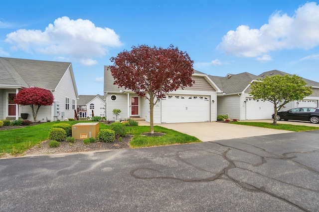 view of front of home featuring an attached garage and concrete driveway