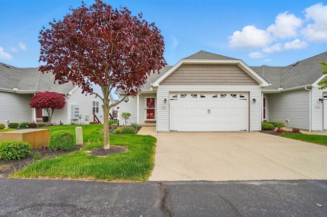 view of front of property with an attached garage and driveway