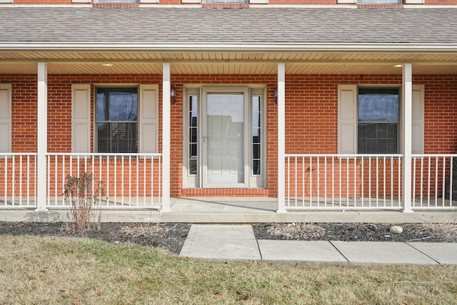 entrance to property with covered porch