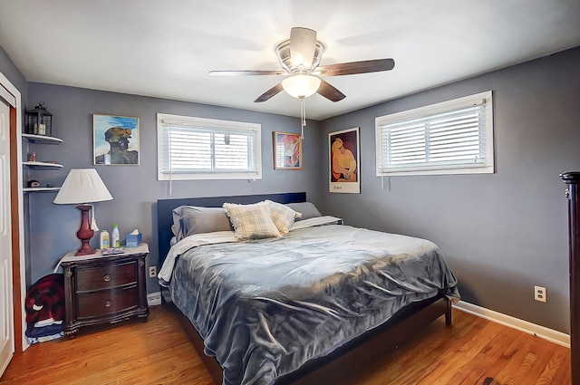 bedroom featuring ceiling fan and hardwood / wood-style floors