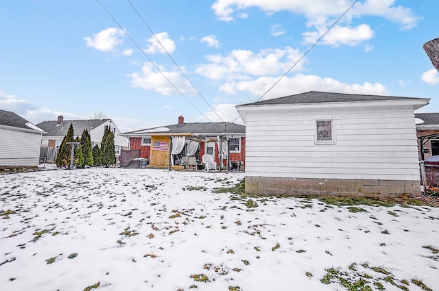 view of snow covered house