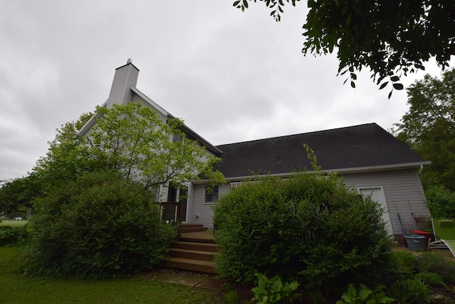 3756 Storms Creek Rd, Urbana, OH 43078 - view of front of home featuring a deck and a chimney
