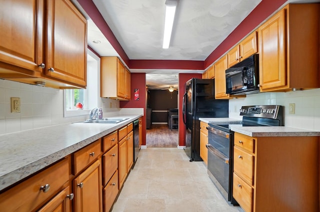 1370 Carpenter Rd, Bellbrook, OH 45305 - kitchen featuring black appliances, backsplash, a sink, and light countertops