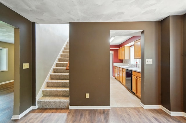 1370 Carpenter Rd, Bellbrook, OH 45305 - staircase featuring baseboards and wood finished floors