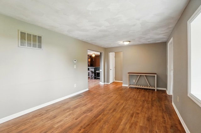 1370 Carpenter Rd, Bellbrook, OH 45305 - spare room featuring wood finished floors and baseboards