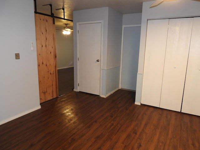 421 Summit St, Sidney, OH 45365 - unfurnished bedroom featuring wood finished floors and a closet