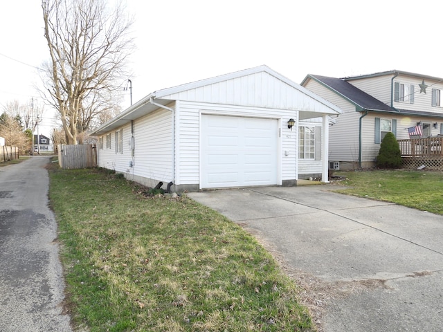 421 Summit St, Sidney, OH 45365 - view of front of home with a front lawn, concrete driveway, and an attached garage